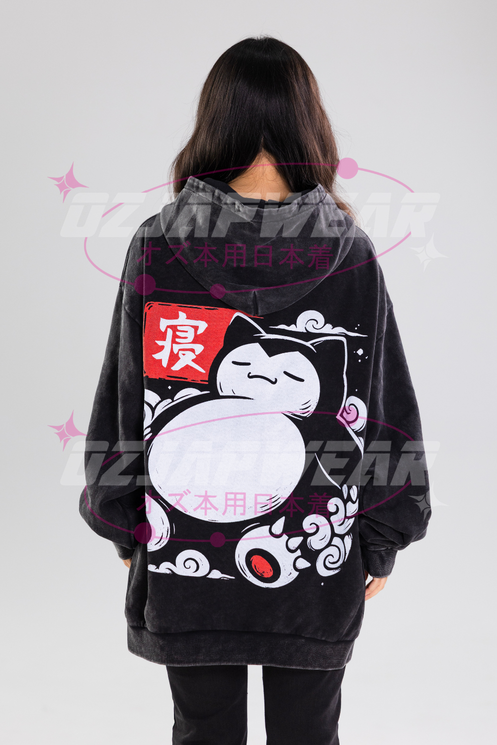Girl wearing a black Snorlax oversized anime hoodie from OzJapwear in Australia.