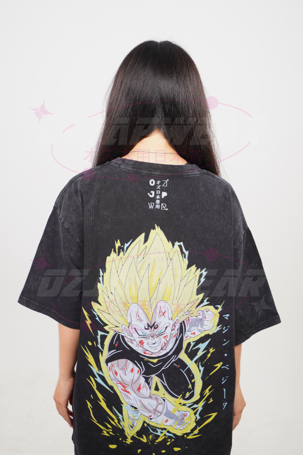 Back view of the OzJapwear Majin Vegeta Oversized Tee featuring a bold full-back anime print with yellow energy aura on black fabric