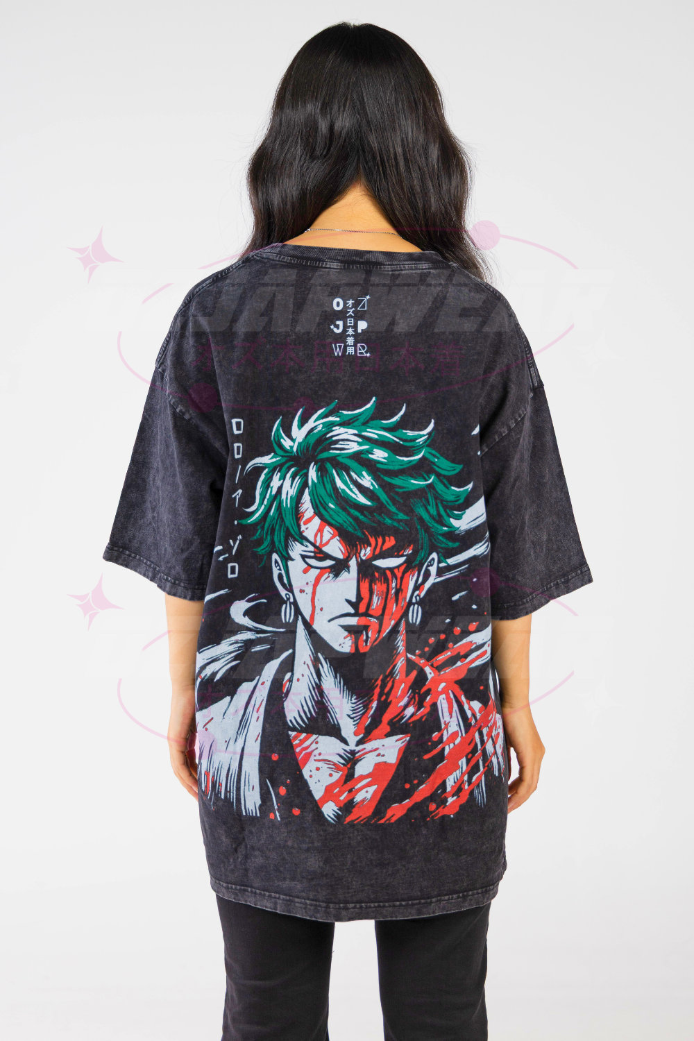 Back view of the OzJapwear Zoro Oversized Tee featuring a bold full-back anime print with green hair details and red accents on black fabric