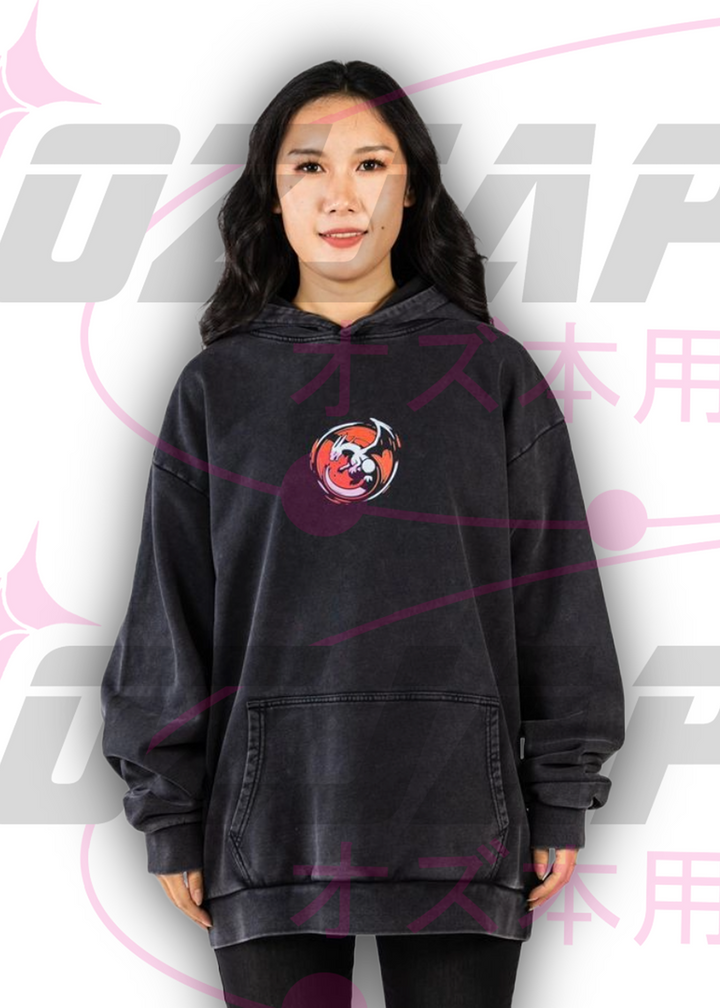 Front view of Charizard oversized hoodie in washed black with embroidered chest emblem and relaxed streetwear fit