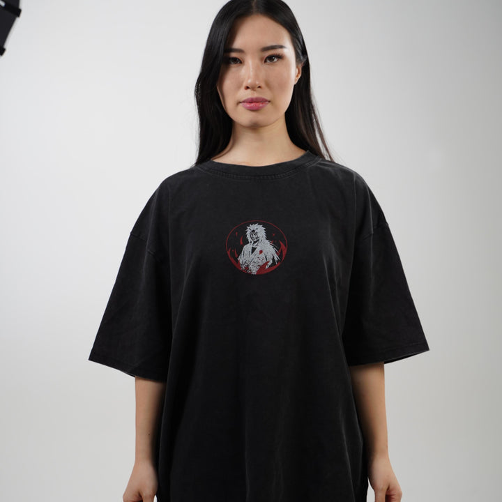 Model wearing the black oversized Jiraiya Naruto tee, showcasing the small front chest design featuring Jiraiya’s face in a red circle.
