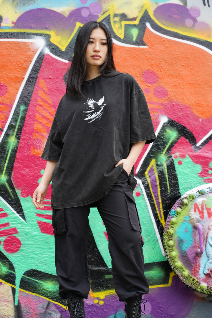 Pre-order Now: Secure your Itachi Uchiha Oversized Tee today and be ready for its exclusive drop in September! High-Quality Material: Made from 100% thick washed cotton for ultimate comfort and durability. Long-lasting Prints: Features DTP prints that resist peeling and fading, ensuring vibrant designs for years to come. Iconic Design: Showcases a powerful front and back artwork of Itachi Uchiha, capturing the intense essence of the Naruto character. Oversized Fit: Provides a relaxed, modern look perfect fo