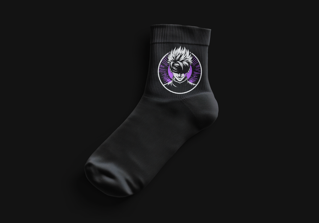 Close-up of black Gojo Crest Socks by OzJapwear. Premium crew socks featuring sharp embroidered Gojo Satoru crest patch with signature blindfold or Six Eyes design in blue and purple accents on the ankle, limited edition collector item