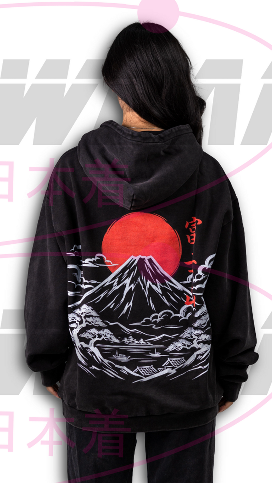Model wearing OzJapwear Fuji-sama Oversized Hoodie featuring a detailed full-back Mount Fuji illustration with a crimson red sun, traditional Japanese scenery, and vintage streetwear styling.