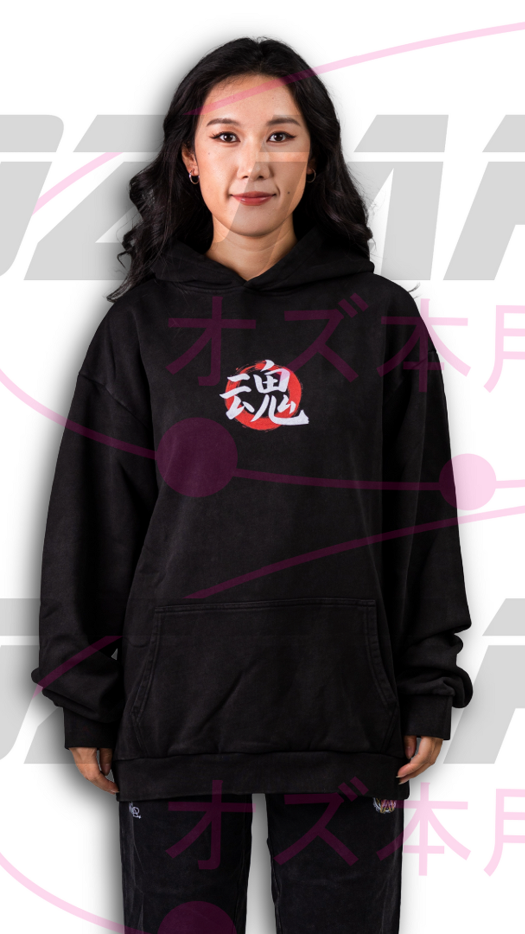 Front view of the OzJapwear Oni Mask Oversized Hoodie with a small red Japanese-inspired chest design on washed black fabric